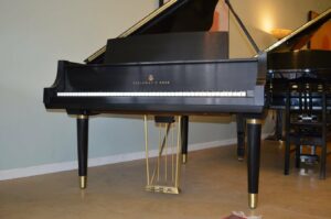 Steinway Model M Centennial Style Walter Dorwin Teague Sketch 1111 art case in ebony satin, front of piano, pictured without bench