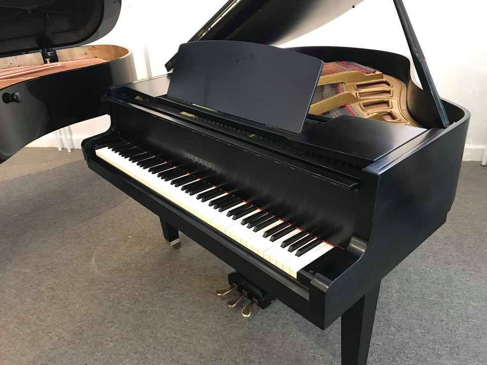5’3″ Yamaha Grand Piano – Satin Black trade-in price plays great – SOLD